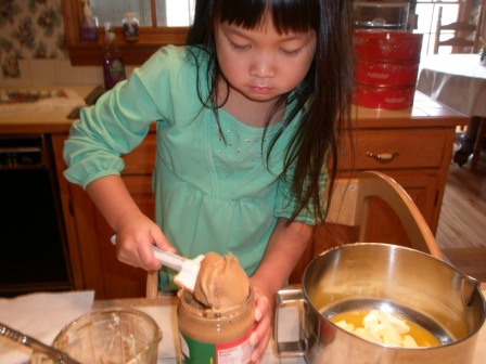 Kasen making peanut butter cookies